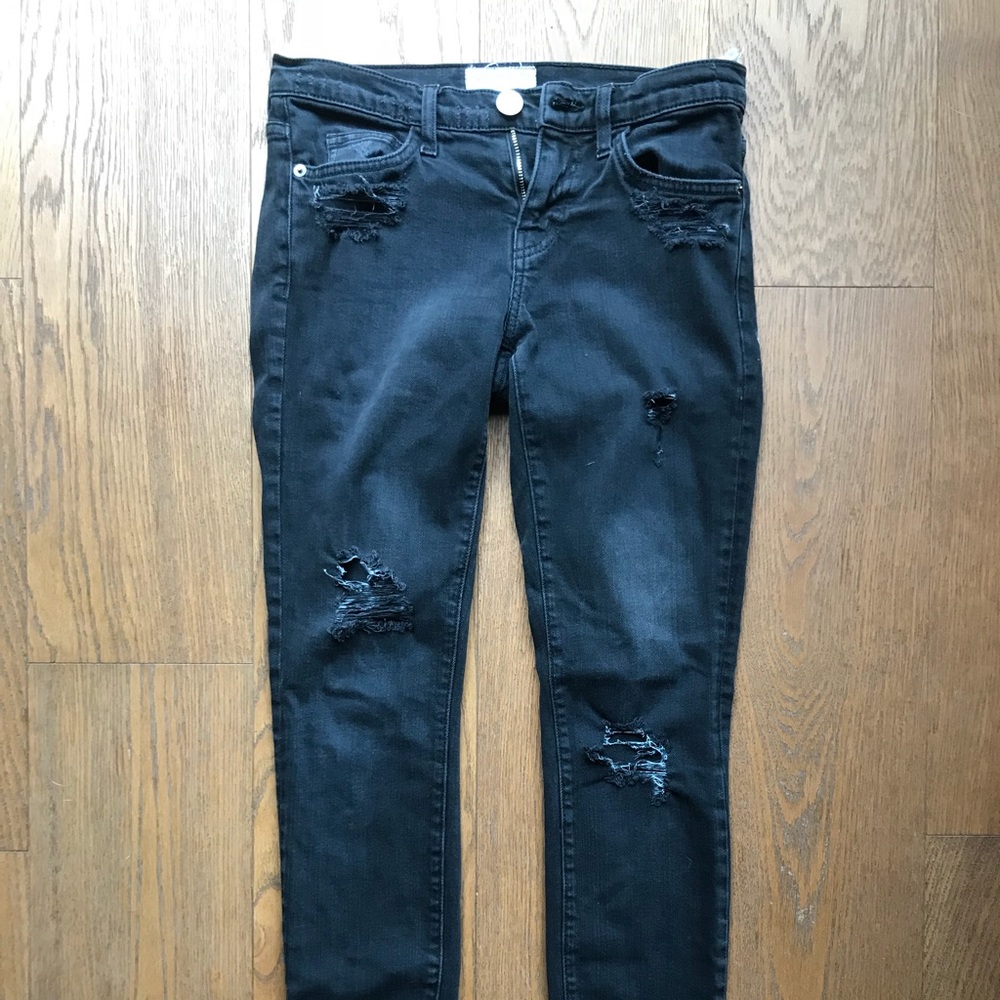 Black mid rise distressed skinny jeans